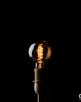 Lampadina edison sfera, led D. 9.5 cm., colore ambra. EDG