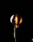 Lampadina edison sfera, led D. 12.5 cm., colore ambra. EDG