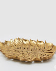 Piatto Monstera a forma di foglia, misura grande, oro, H.3x29x24cm. EDG