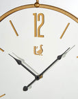 Orologio Parete specchio e metallo oro. L'oca nera