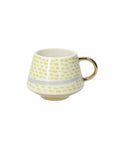 Mug con disegni giallo e oro. Tognana
