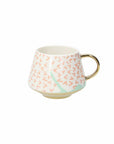 Mug con disegni arancio e oro. Tognana