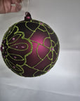 Palla con disegno a rilievo viola e verde, diametro 15cm. Sia Home Fashion