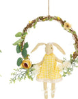 Ghirlanda da appendere con coniglietto con vestito a quadri e fiori gialli. Blanc Mariclò