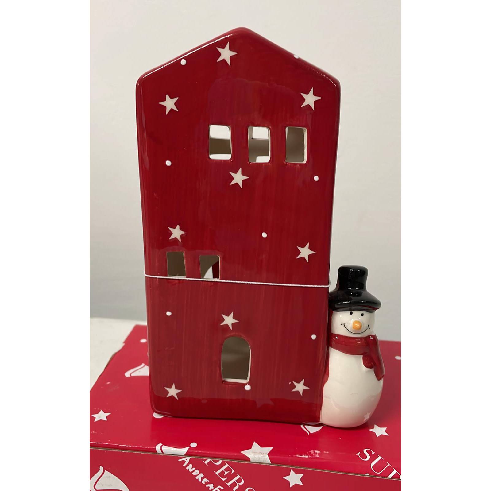 Casetta porta-tealight in ceramica disegno rosso stelle e pupazzo di neve. Tognana