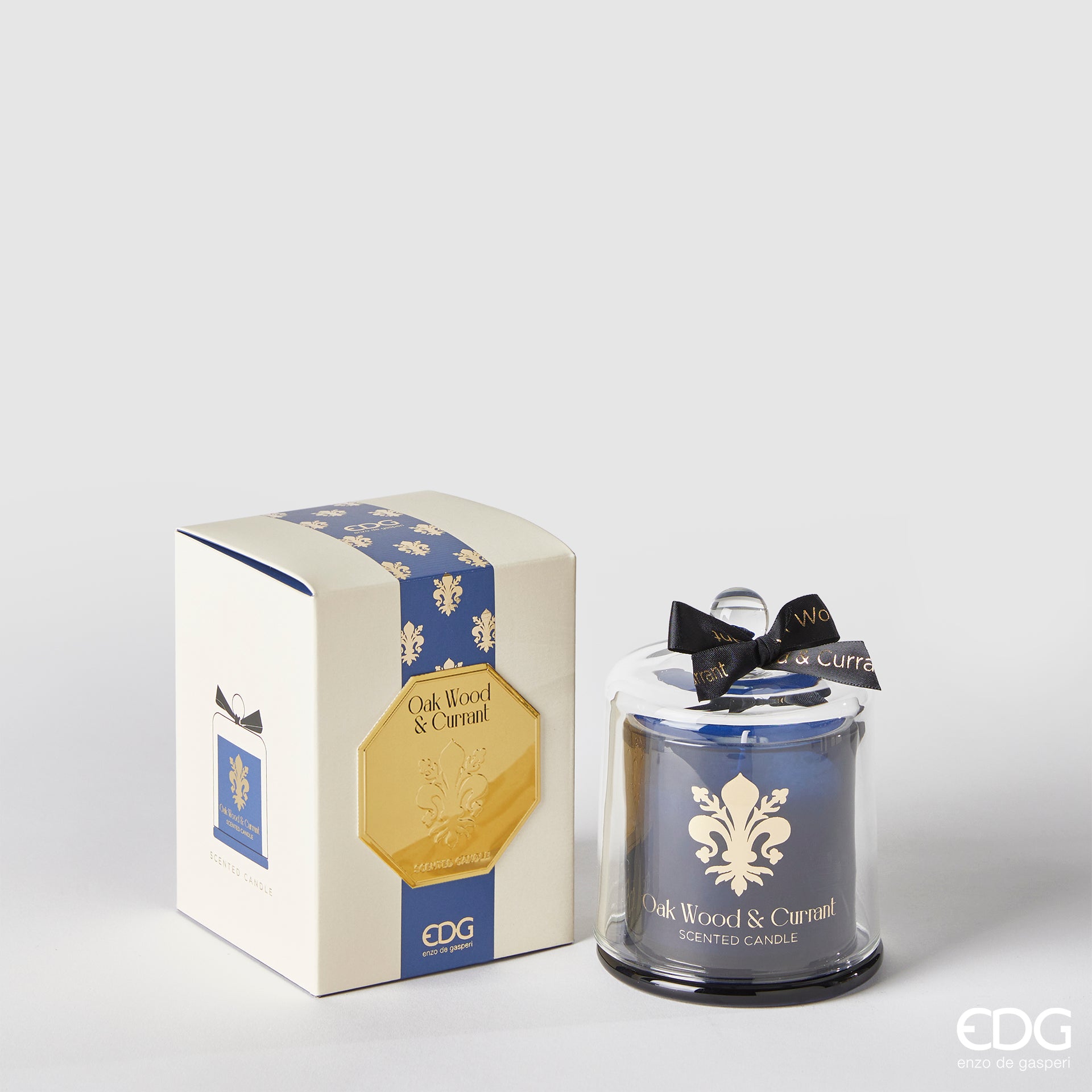 Candela profumata in vetro, con cupola Goldlily, colore blu, H.15 cm. EDG