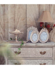 Portafoto piccolo con fiocco e ornamenti barocchi. Blanc Mariclò