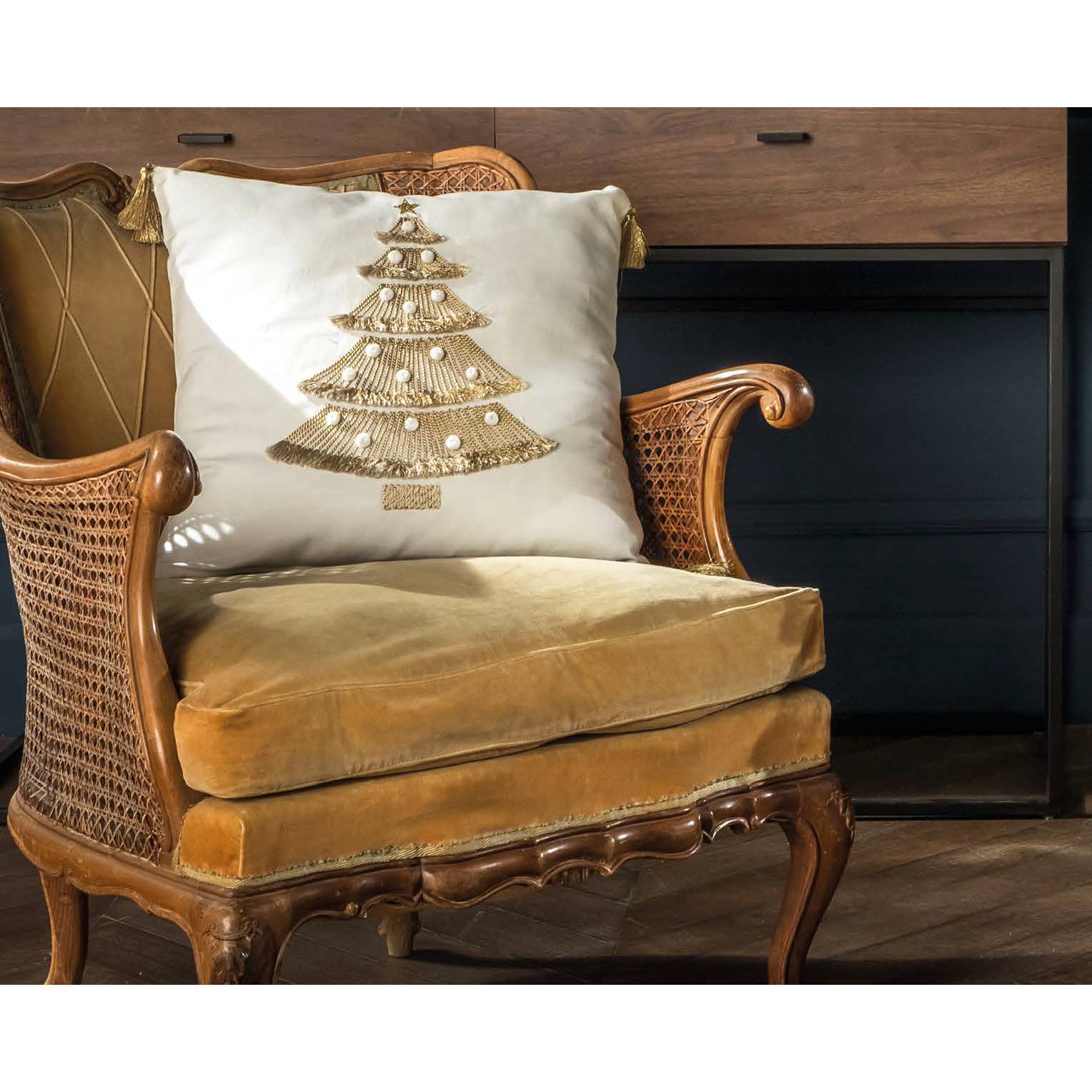 Cuscino natalizio con albero ricamato in oro. L'oca nera