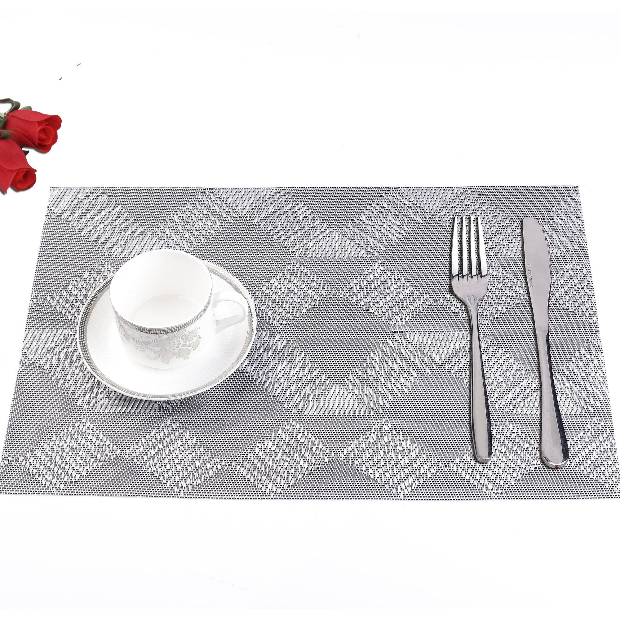 Tovaglietta americana "Anita" in pvc, colore grigio a rombi.