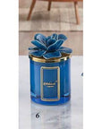 Candela grande 300 gr. con tappo fiore, colore blu, in porcellana Capodimonte. Melaverde