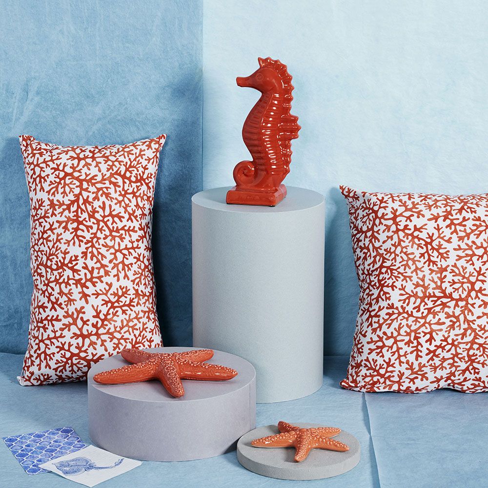 Stella marina, colore rosso corallo, in ceramica. H. 3cm. x 18cm. Tognana