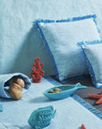 Piatto conchiglia, colore turchese, in ceramica. 14x20 cm. Tognana
