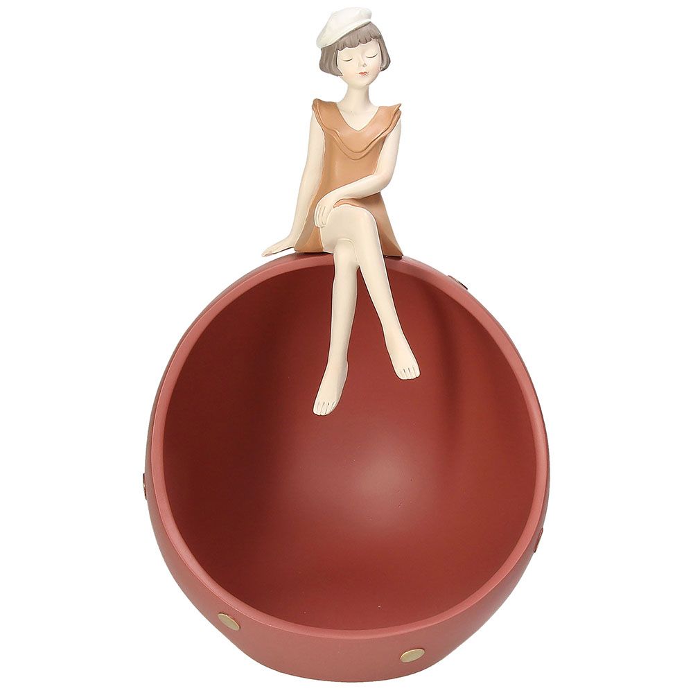 Statua Donna "Tina", in resina, colore vestito giallo su boule ruggine. Tognana